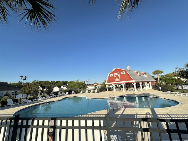 514 Hay Hill Ln Unit C, Myrtle Beach, SC 29579 - community pool featuring a patio area