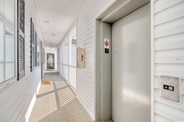 1533 Lanterns Rest Rd Unit 304, Myrtle Beach, SC 29579 - hallway with elevator and tile patterned flooring