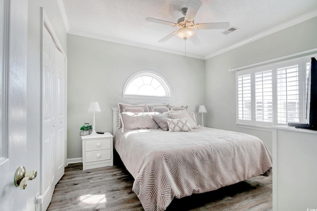1533 Lanterns Rest Rd Unit 304, Myrtle Beach, SC 29579 - bedroom with wood finished floors, visible vents, ornamental molding, and multiple windows