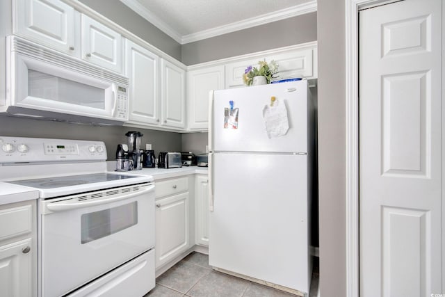 1533 Lanterns Rest Rd Unit 304, Myrtle Beach, SC 29579 - kitchen with white cabinets, light countertops, white appliances, and crown molding