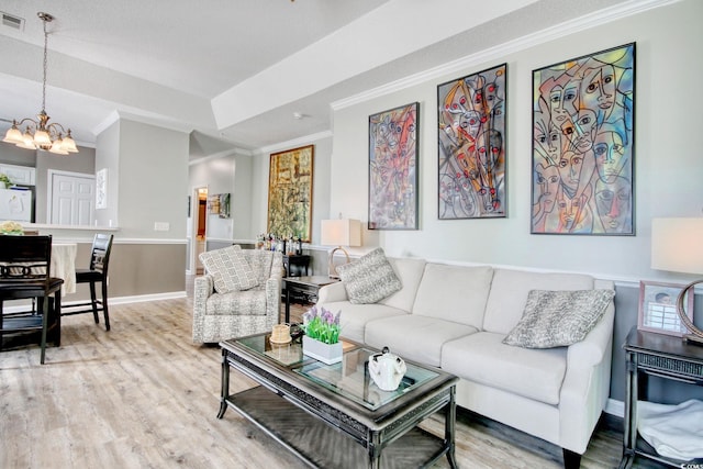 1533 Lanterns Rest Rd Unit 304, Myrtle Beach, SC 29579 - living room featuring crown molding, wood finished floors, a chandelier, and visible vents