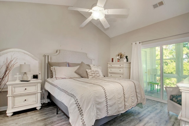1533 Lanterns Rest Rd Unit 304, Myrtle Beach, SC 29579 - bedroom with lofted ceiling, wood finished floors, visible vents, and access to exterior