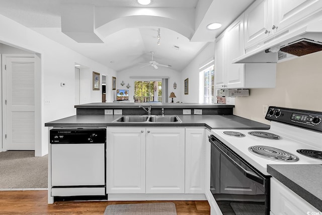 4430 Eastport Blvd Unit L15, Little River, SC 29566 - kitchen featuring range with electric stovetop, white dishwasher, under cabinet range hood, ceiling fan, and a peninsula