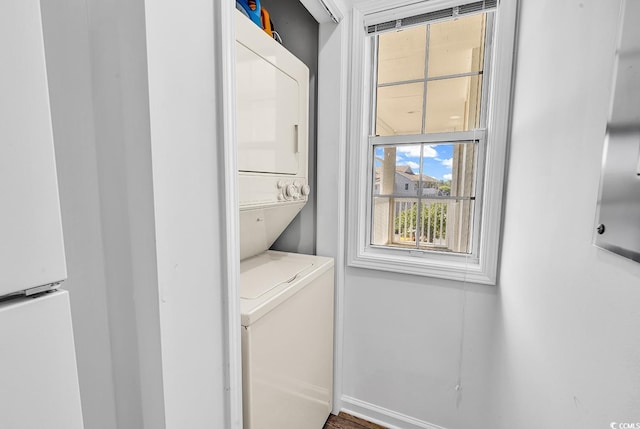 4430 Eastport Blvd Unit L15, Little River, SC 29566 - laundry room with stacked washing machine and dryer and baseboards