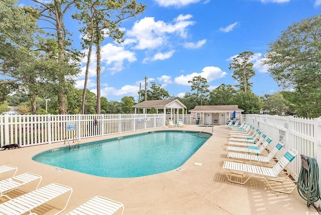 4430 Eastport Blvd Unit L15, Little River, SC 29566 - community pool with a patio area and view of scattered trees