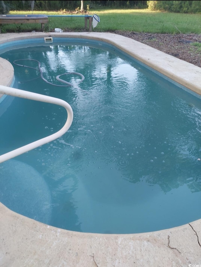 2560 Wise Rd, Conway, SC 29526 - outdoor pool featuring a lawn