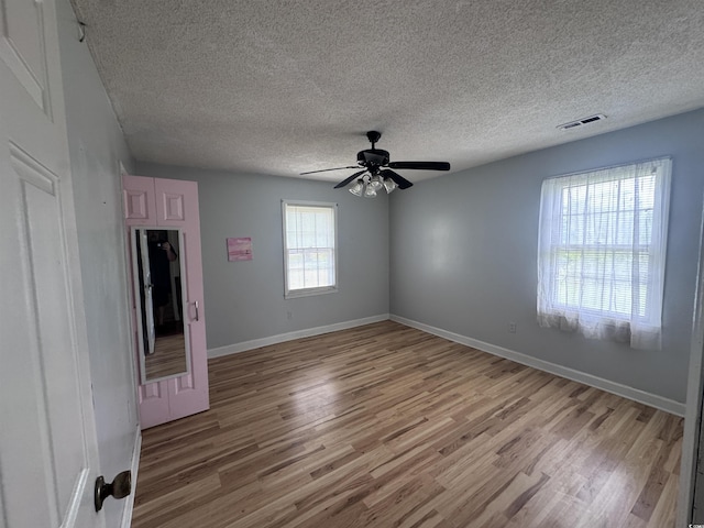 2560 Wise Rd, Conway, SC 29526 - unfurnished room featuring visible vents, a textured ceiling, and wood finished floors