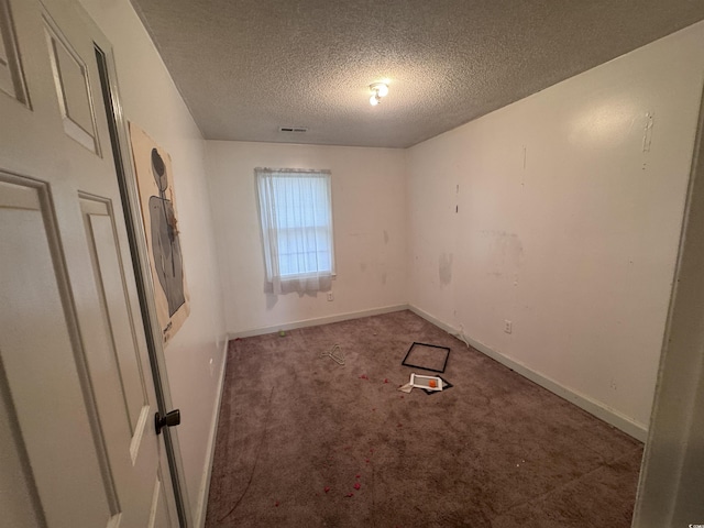 2560 Wise Rd, Conway, SC 29526 - carpeted spare room with baseboards, a textured ceiling, and visible vents