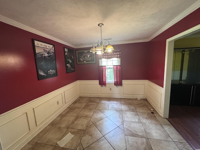 2560 Wise Rd, Conway, SC 29526 - unfurnished dining area featuring a notable chandelier, wainscoting, and a decorative wall