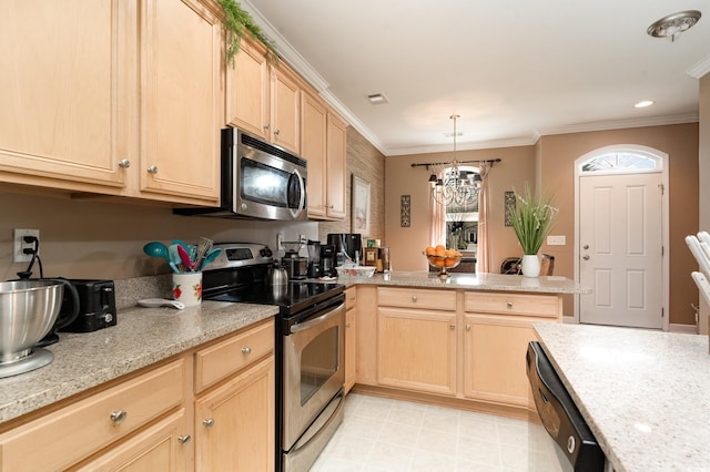 830 Howard Ave Unit D, Myrtle Beach, SC 29577 - kitchen featuring appliances with stainless steel finishes, light brown cabinets, a peninsula, plenty of natural light, and crown molding