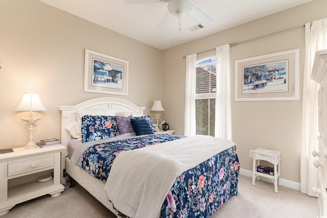 830 Howard Ave Unit D, Myrtle Beach, SC 29577 - bedroom with light colored carpet, baseboards, and ceiling fan
