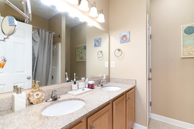 830 Howard Ave Unit D, Myrtle Beach, SC 29577 - full bathroom with double vanity, a shower with shower curtain, and tile patterned floors
