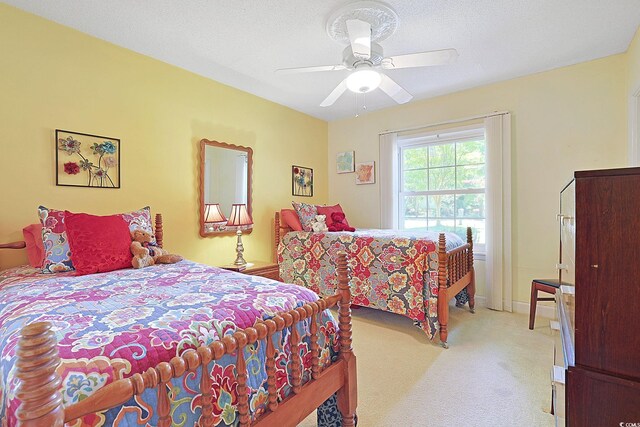 412 43rd Ave N, Myrtle Beach, SC 29577 - bedroom featuring light colored carpet and ceiling fan