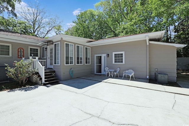 412 43rd Ave N, Myrtle Beach, SC 29577 - rear view of house featuring a patio