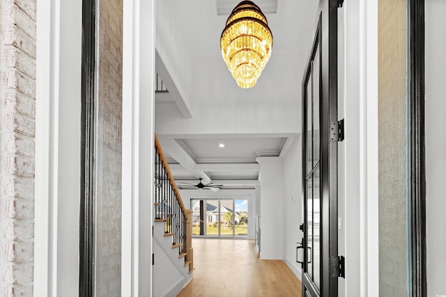 1219 Bentcreek Ln, Myrtle Beach, SC 29579 - foyer with a chandelier, coffered ceiling, stairway, wood finished floors, and beamed ceiling