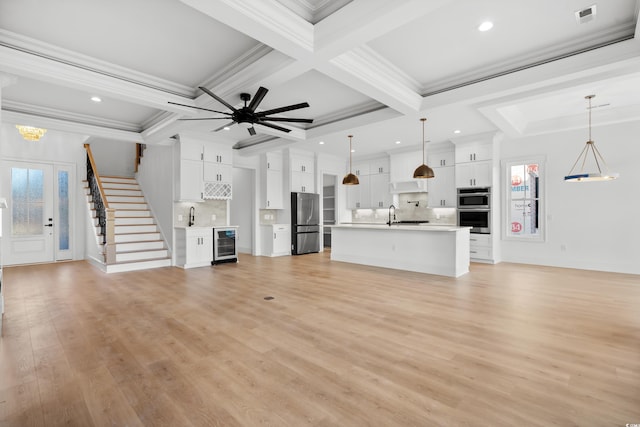 1219 Bentcreek Ln, Myrtle Beach, SC 29579 - unfurnished living room featuring beverage cooler, crown molding, light wood finished floors, beam ceiling, and recessed lighting