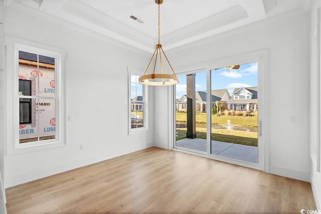 1219 Bentcreek Ln, Myrtle Beach, SC 29579 - unfurnished dining area with crown molding, wood finished floors, a raised ceiling, and baseboards