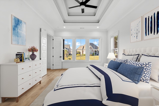 1219 Bentcreek Ln, Myrtle Beach, SC 29579 - bedroom featuring ornamental molding, light wood-style flooring, a raised ceiling, and recessed lighting