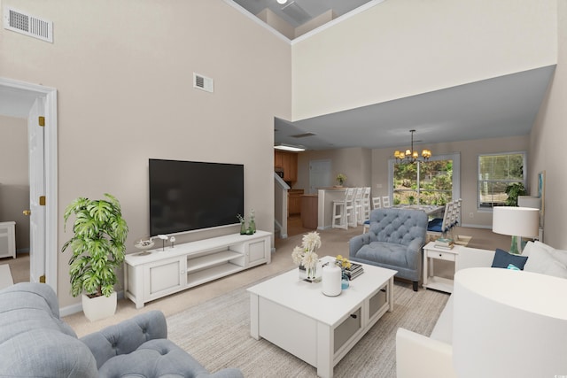 1004 Harvester Cir Unit 1004, Myrtle Beach, SC 29579 - living area featuring a chandelier, a towering ceiling, light colored carpet, and baseboards