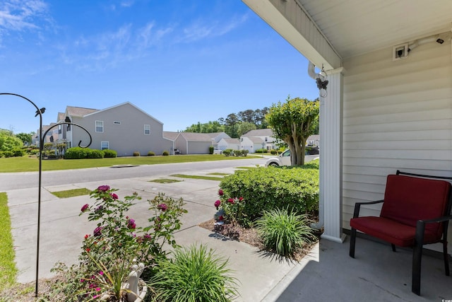 1004 Harvester Cir Unit 1004, Myrtle Beach, SC 29579 - view of patio / terrace featuring a residential view
