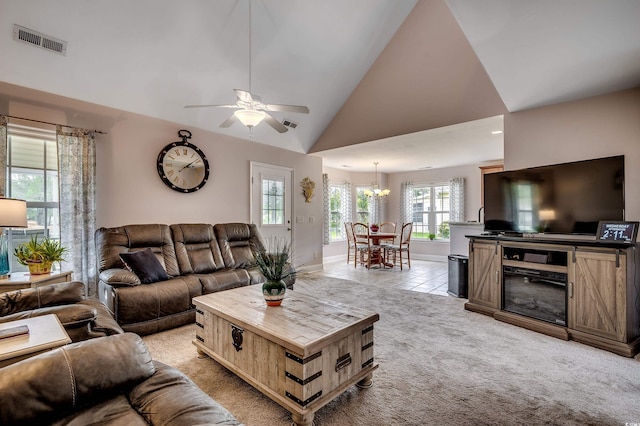 1001 Harvest View Ave, Conway, SC 29527 - living area featuring a chandelier, a ceiling fan, lofted ceiling, light carpet, and light tile patterned floors