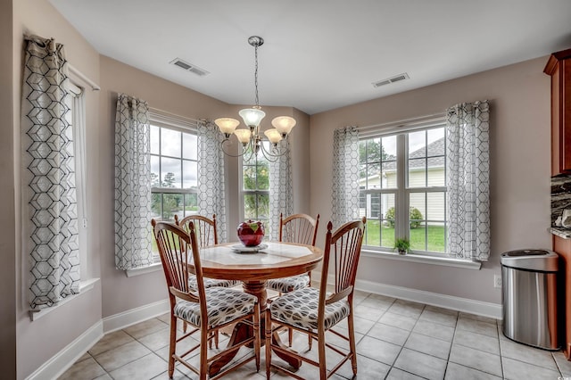 1001 Harvest View Ave, Conway, SC 29527 - dining area with a chandelier, plenty of natural light, and light tile patterned flooring