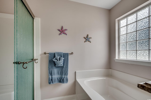 1001 Harvest View Ave, Conway, SC 29527 - bathroom with a bath and a shower with shower door