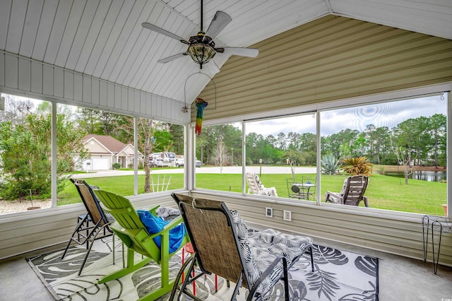 1001 Harvest View Ave, Conway, SC 29527 - sunroom / solarium with vaulted ceiling, ceiling fan, plenty of natural light, and view of wooded area