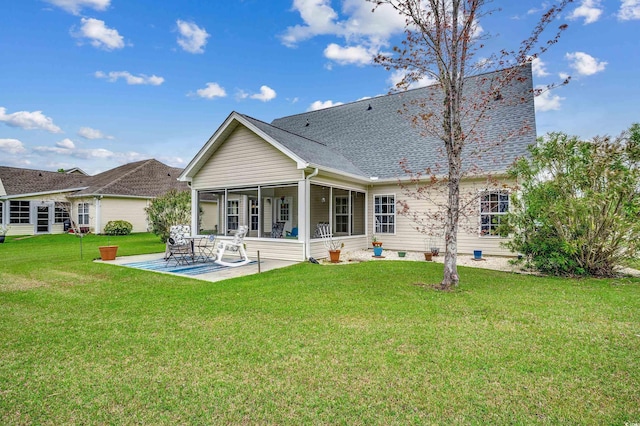 1001 Harvest View Ave, Conway, SC 29527 - back of property featuring a sunroom, a lawn, a patio area, and a shingled roof