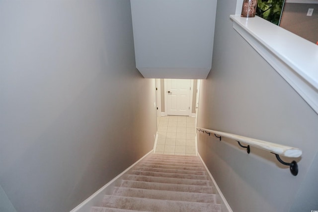 stairs featuring baseboards