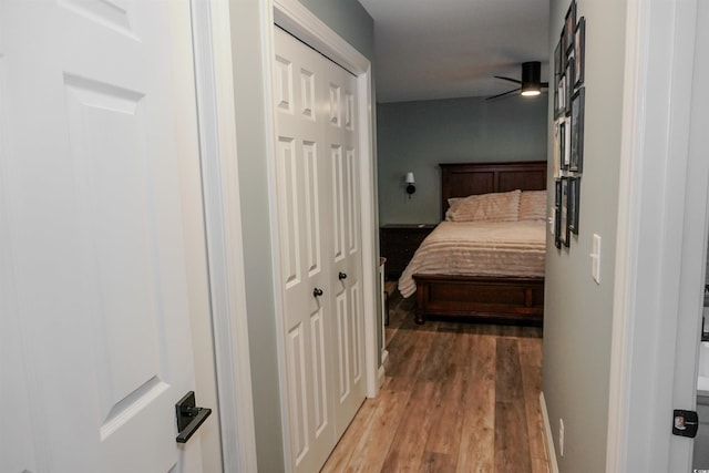 hallway with wood finished floors