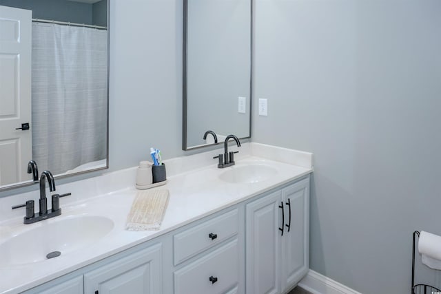 full bathroom with double vanity