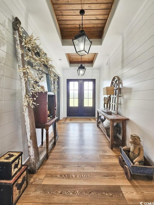 2300 Tansy Rd, Loris, SC 29569 - foyer entrance featuring french doors, wooden ceiling, a tray ceiling, and wood-type flooring