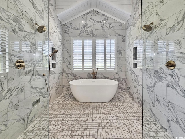 2300 Tansy Rd, Loris, SC 29569 - full bath with a walk in shower, a freestanding bath, lofted ceiling, and tile walls