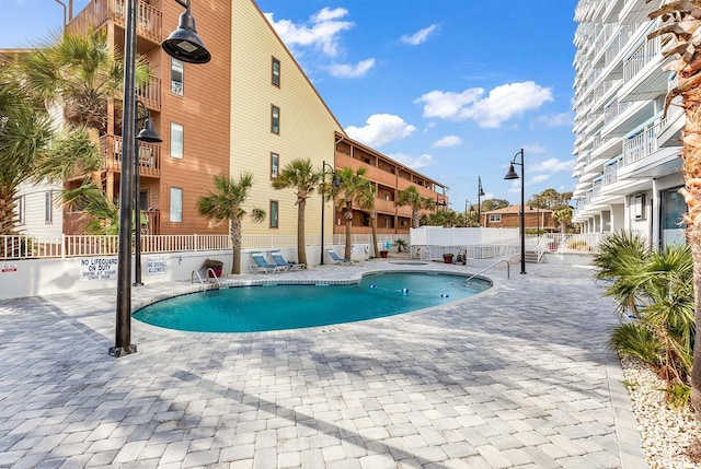 5511 N Ocean Blvd Unit 209, Myrtle Beach, SC 29577 - community pool featuring a patio area