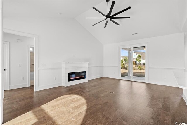 163 Sago Palm Dr, Myrtle Beach, SC 29579 - unfurnished living room featuring a ceiling fan, a glass covered fireplace, wood finished floors, high vaulted ceiling, and baseboards