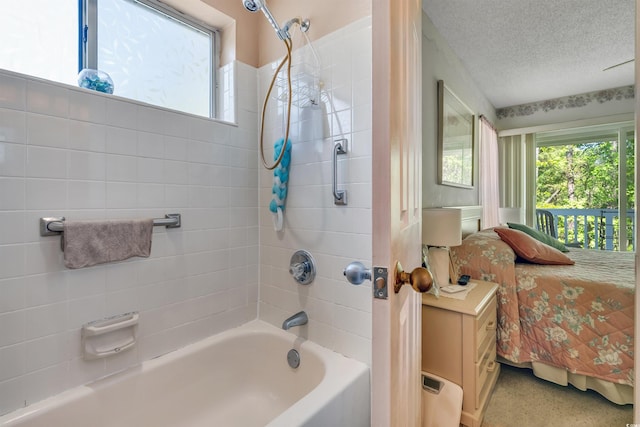 4601 Greenbriar Dr Unit 201, Little River, SC 29566 - full bathroom with a textured ceiling, a healthy amount of sunlight, vanity, and shower / bathtub combination