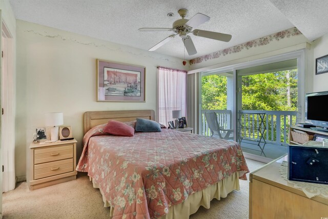 4601 Greenbriar Dr Unit 201, Little River, SC 29566 - bedroom featuring a textured ceiling, a ceiling fan, light colored carpet, and access to outside