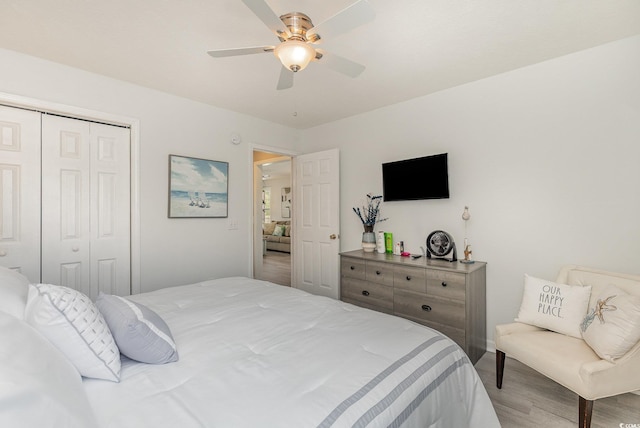 619 Waterway Village Blvd Unit 7C, Myrtle Beach, SC 29579 - bedroom with ceiling fan, wood finished floors, and a closet