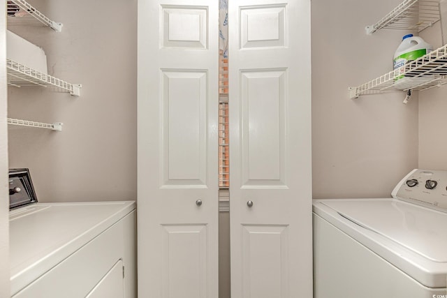 619 Waterway Village Blvd Unit 7C, Myrtle Beach, SC 29579 - clothes washing area featuring separate washer and dryer