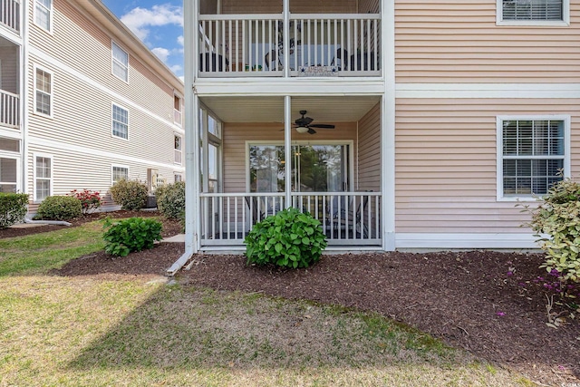 619 Waterway Village Blvd Unit 7C, Myrtle Beach, SC 29579 - view of exterior entry with a ceiling fan and a balcony
