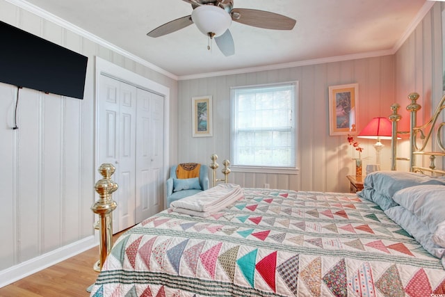 1028 1st Ave S, North Myrtle Beach, SC 29582 - bedroom with a ceiling fan, crown molding, light wood finished floors, and a closet