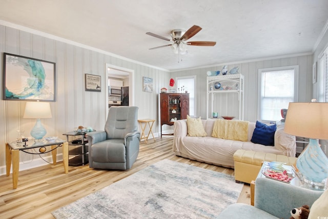 1028 1st Ave S, North Myrtle Beach, SC 29582 - living room with a ceiling fan, wood finished floors, and crown molding
