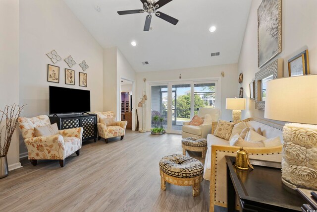 136 Queens Cove Pl Unit B, Myrtle Beach, SC 29579 - living area with high vaulted ceiling, ceiling fan, wood finished floors, recessed lighting, and baseboards