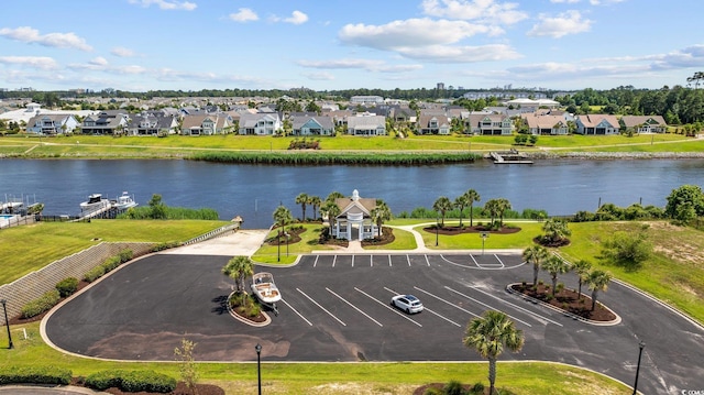 136 Queens Cove Pl Unit B, Myrtle Beach, SC 29579 - aerial perspective of suburban area featuring a nearby body of water