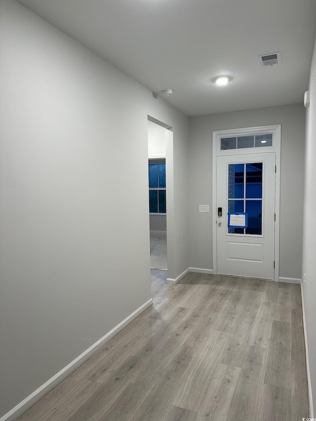 190 Glengrove Ln, Murrells Inlet, SC 29576 - doorway with light wood-style flooring and baseboards