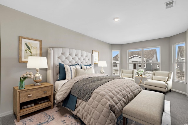 186 Glengrove Ln, Murrells Inlet, SC 29576 - bedroom featuring baseboards, visible vents, and light carpet