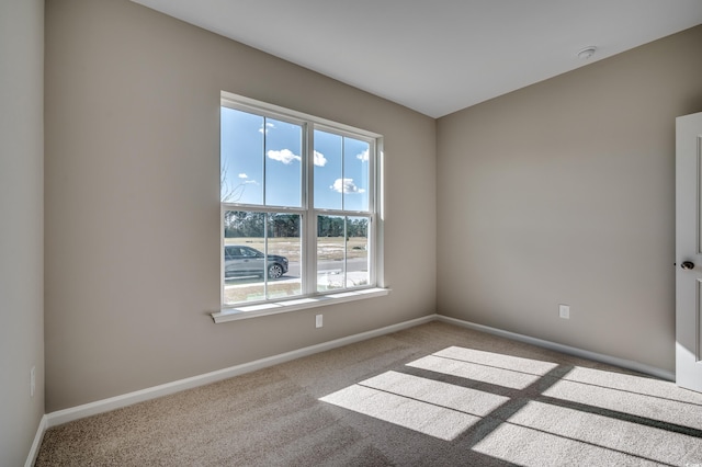186 Glengrove Ln, Murrells Inlet, SC 29576 - spare room featuring baseboards and carpet flooring