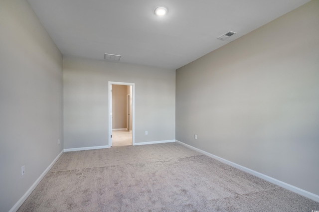 186 Glengrove Ln, Murrells Inlet, SC 29576 - spare room featuring baseboards, visible vents, and light colored carpet