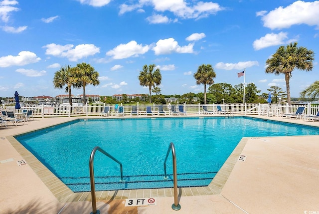 4755 Lightkeepers Way Unit 15-E, Little River, SC 29566 - pool with a patio area and fence